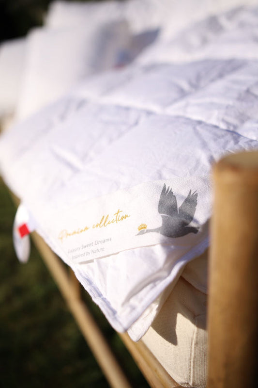 Kaip tinkamai išskalbti pūkinę antklodę?